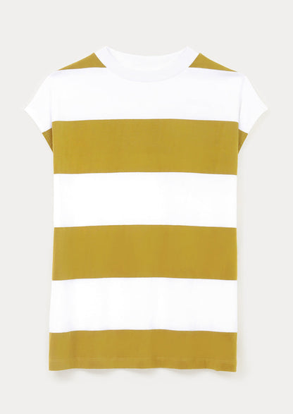 A woman wearing a white and mustard striped muscle tee.
