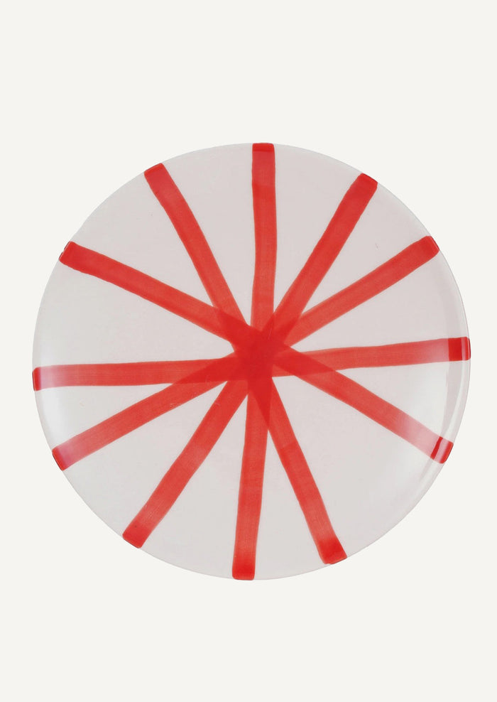 A footed ceramic pedestal in white with red stripes.
