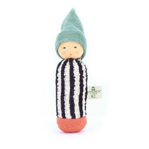 Small rattle doll with a striped outfit and green hat on a white background