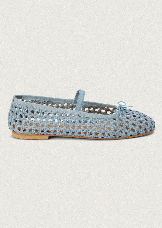 A pair of open weave leather ballet flats in powder blue.