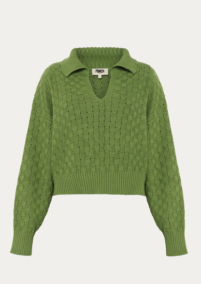 A collared v-neck sweater with woven texture in moss green.