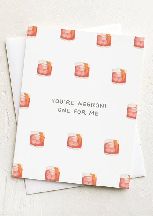 Greeting card with negroni glass pattern and text 'You're Negroni One for Me'.