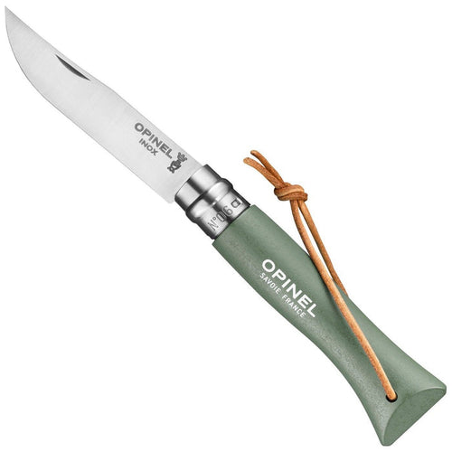 Opinel No.6 Colorama folding pocket knife open, showing stainless steel blade, sage green hornbeam handle with Virobloc safety ring, and leather lanyard