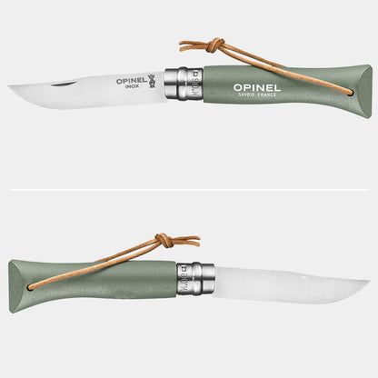 Opinel No.6 Colorama pocket knife shown from two angles — blade side and spine side — with sage green handle and leather lanyard, knife open