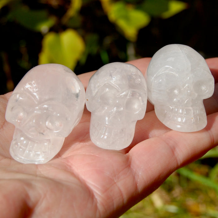 ONE 1.5" Clear Quartz Crystal Skull, Primitive Style Carving