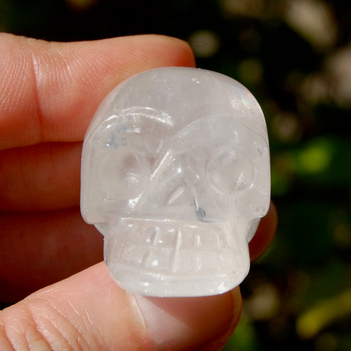 ONE 1.5" Clear Quartz Crystal Skull, Primitive Style Carving