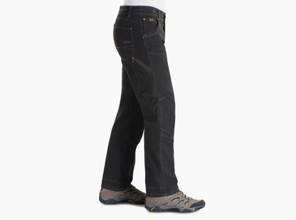 Side view of the Kuhl The Law pant in espresso showing the side seam and leg pocket