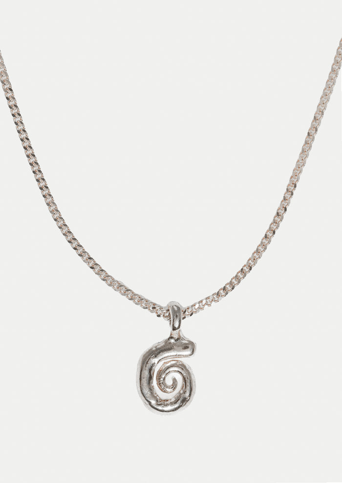 Silver necklace with a spiral pendant on a white background